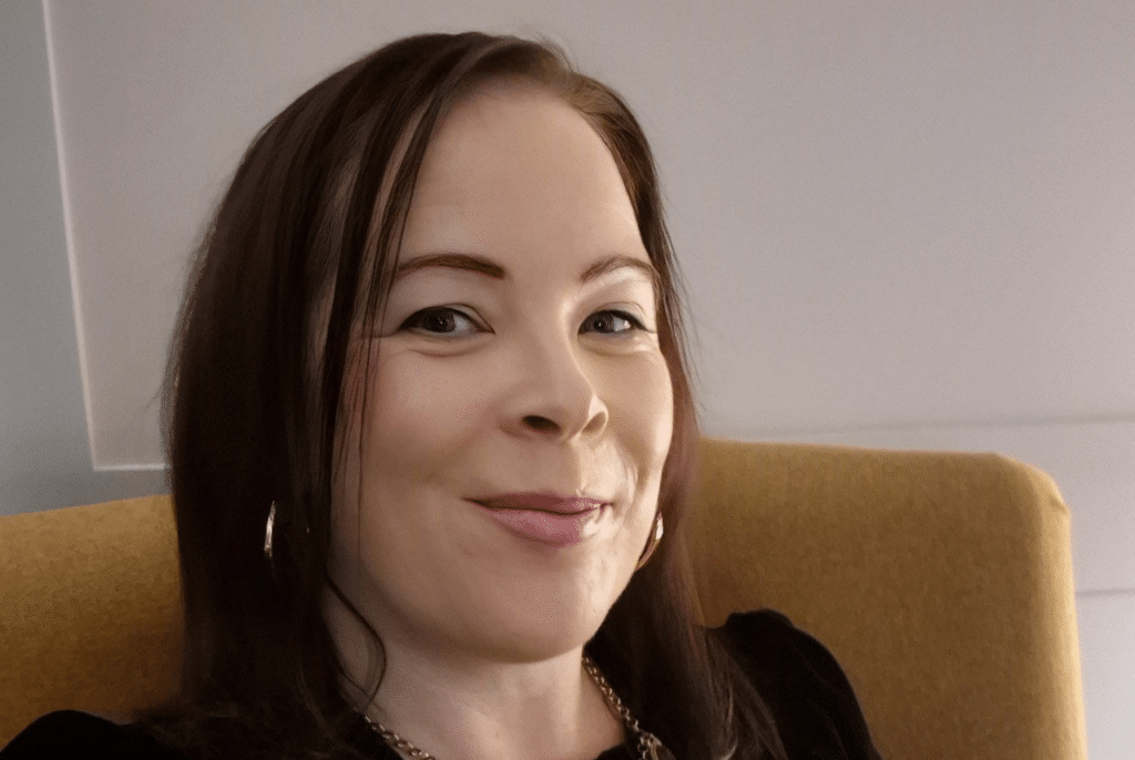 podcast interview graphic with a photo of Rikki Sullivan, the Canine Copywriter