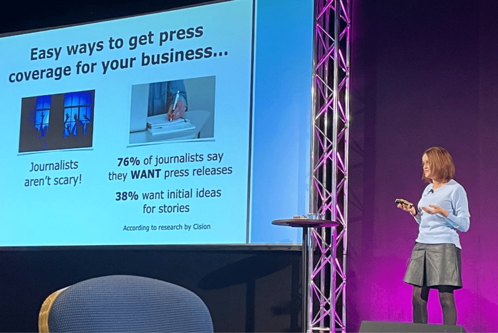 Pet business coach Rachel Spencer on stage at event