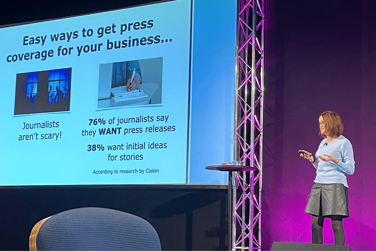 Pet business coach Rachel Spencer on stage at event